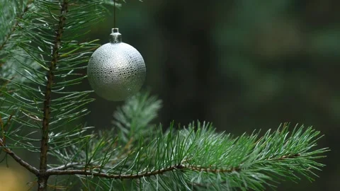Seamless Holiday Motion Background with Silver Bauble and Bokeh Stock-Footage 344405186