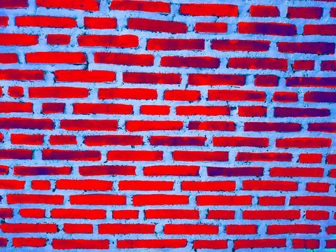 Seamless image of a bright red wall with white stripes Stock Photos