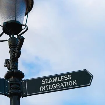 SEAMLESS INTEGRATION directional sign on guidepost Stock Photos