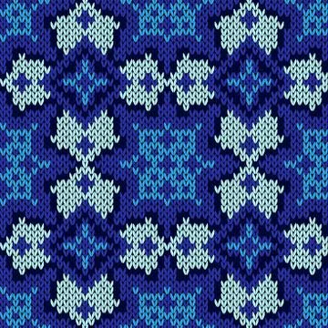 Seamless knitted blue ethnic pattern Illustrazione stock