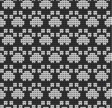 Seamless knitted pattern with cat paws knitwear pattern fabric Ilustración de archivo