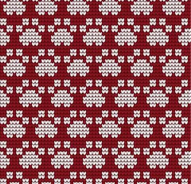 Seamless knitted pattern with cat paws knitwear pattern fabric Stock Illustration