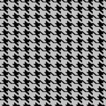 Seamless knitted woolen pattern Houndstooth. Black and white hounds tooth che Stock Illustration