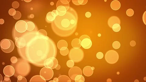 Seamless loop of abstract orange and gold bokeh particles. Warm glowing spheres Stock Footage 334053980