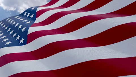 Seamless Loop of American Flag Waving Against Blue Sky and Clouds Stock Footage 336287246