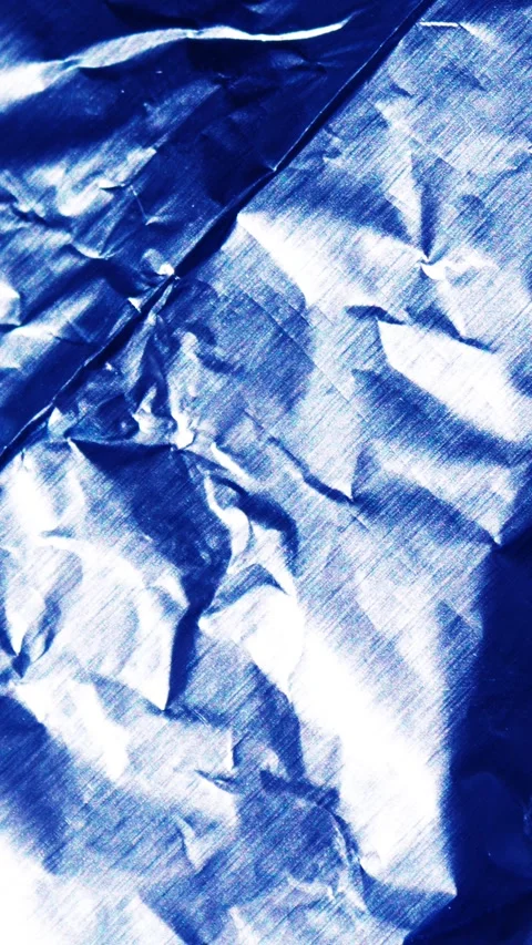 Seamless Loop Animated Blue Foil Paper Texture Background Subtle Organic Surf Video stock 331081330