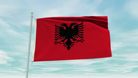 Seamless loop animation of the Albania flag on a blue sky background. Stock Footage 211122136