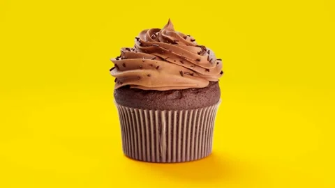 Seamless loop animation of a delicious cupcake with chocolate cream, sprinkles. Video stock 133459390