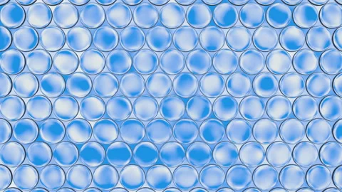 Seamless loop animation of dense glass bubble lenses reflecting a cyan blue nois Stock Footage 335095191