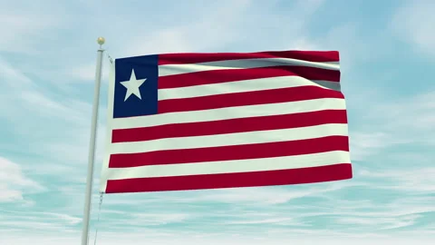 Seamless loop animation of the Liberia flag on a blue sky background. Stock Footage 211131570