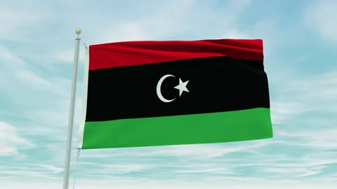 Seamless loop animation of the Libya flag on a blue sky background. Stock Footage 211106121