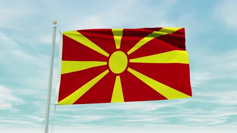 Seamless loop animation of the Macedonia flag on a blue sky background. Stock Footage 211109039