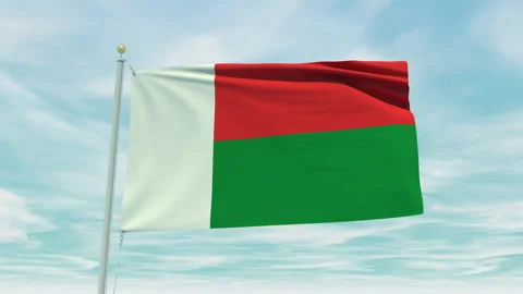 Seamless loop animation of the Madagascar flag on a blue sky background. Stock Footage 211133220