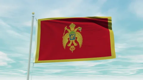 Seamless loop animation of the Montenegro flag on a blue sky background. Stock Footage 211134046