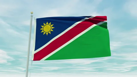 Seamless loop animation of the Namibia flag on a blue sky background. Stock Footage 211130054