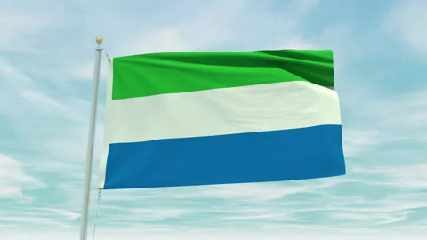 Seamless loop animation of the Sierra Leone flag on a blue sky background. Stock Footage 211123790