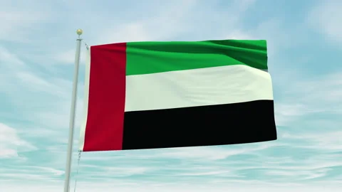 Seamless loop animation of the United Arab Emirates flag on a blue sky Stock Footage 211114306