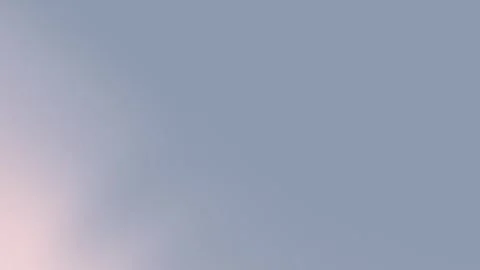 Seamless loop background in 4K. Features a soft gradient from dusty blue to pale Stock Footage 299447691