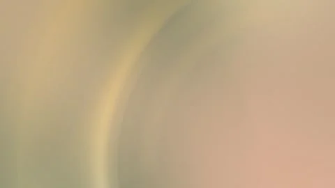 Seamless loop background in 4K featuring a soft gradient of beige and pink with Stock Footage 299397720