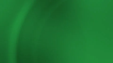 Seamless loop background in 4K featuring abstract green gradient with soft Stock Footage 299397806