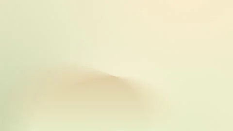 Seamless loop background in 4K featuring a soft beige gradient with a shadowy Stock Footage 299447818