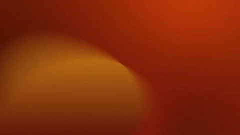 Seamless loop background in 4K featuring smooth, blended warm hues of red and Stockbeeldmateriaal 309058724