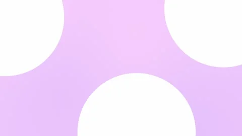 Seamless loop background in 4K featuring large white ovals on a pastel pink Stock Footage 309855847