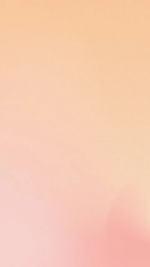 Seamless loop background in 4K featuring a soft peach and pink gradient with Vídeo Stock 309855948