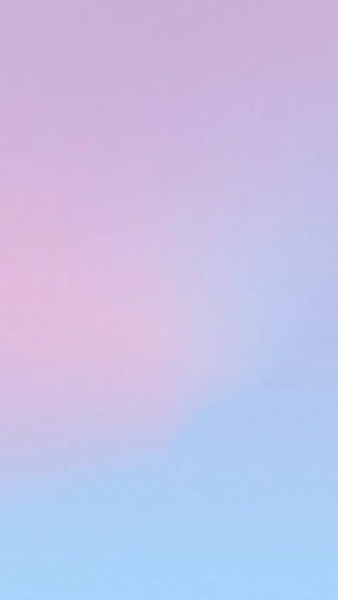 Seamless loop background in 4K, featuring a soft pastel gradient from pink to Vidéo 309856185