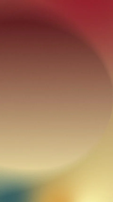 Seamless loop background in 4K featuring a soft gradient blend of red, beige, Stockbeeldmateriaal 309956985