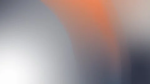 Seamless loop background in 4K featuring a smooth gradient with soft orange and 動画素材 310143369