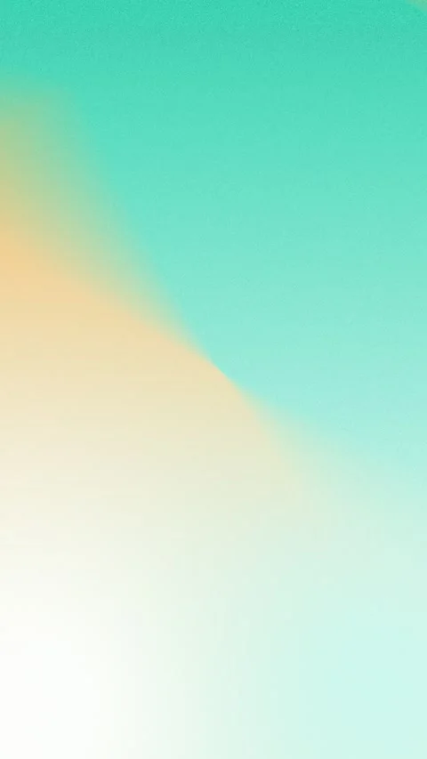 Seamless loop background in 4K featuring a smooth gradient of teal and orange Stockbeeldmateriaal 310143454