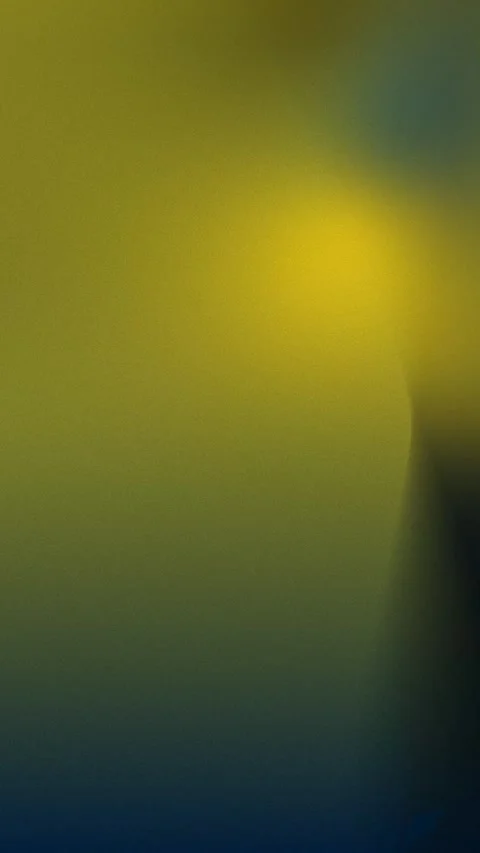 Seamless loop background in 4K with gradient yellow and blue hues, blurred Vidéo 309701204