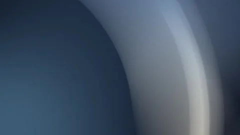 Seamless loop background in 4K with gray and blue gradient curves. Vídeo Stock 309701045