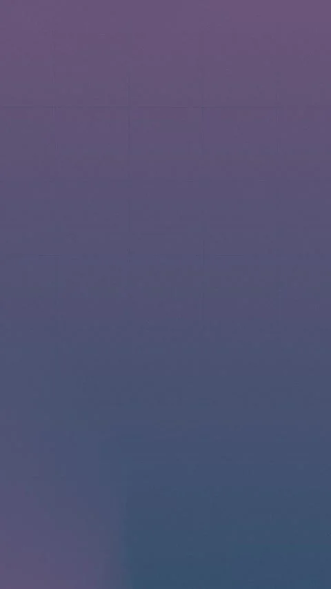 Seamless loop background in 4K with a purple to blue gradient texture. Stockbeeldmateriaal 309956898