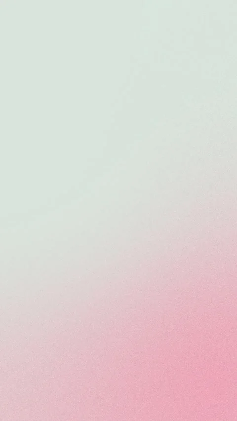 Seamless loop background in 4K showcasing a soft pink and white gradient with a Stockbeeldmateriaal 310143441