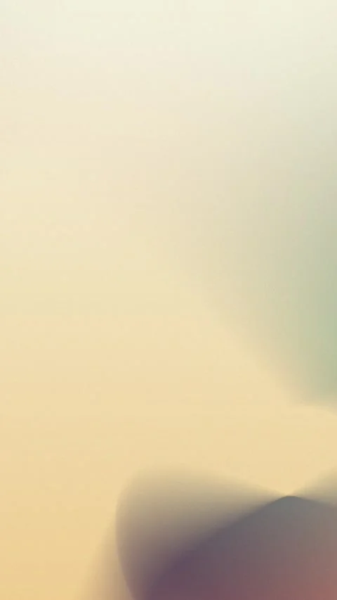 Seamless loop background in 4K showing a blurred gradient with soft beige, Stock Footage 310143573