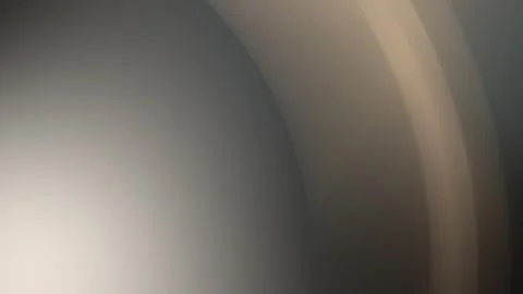 Seamless loop background in 4K. Smooth gradient of soft gray and beige hues with Stock Footage 300840264