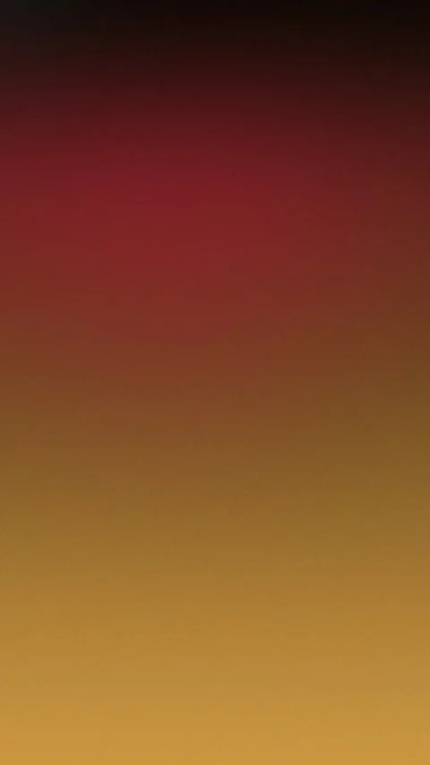 Seamless loop background in 4K with a smooth gradient from deep red to golden Vidéo 309701622