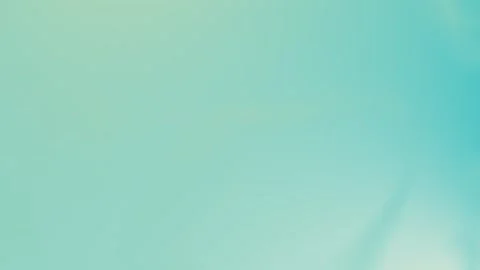 Seamless loop background in 4K with a smooth teal gradient and subtle shading. Stockbeeldmateriaal 309856102