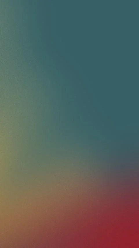 Seamless loop background in 4K with a smooth gradient from teal to red. Soft Stock Footage 309956443