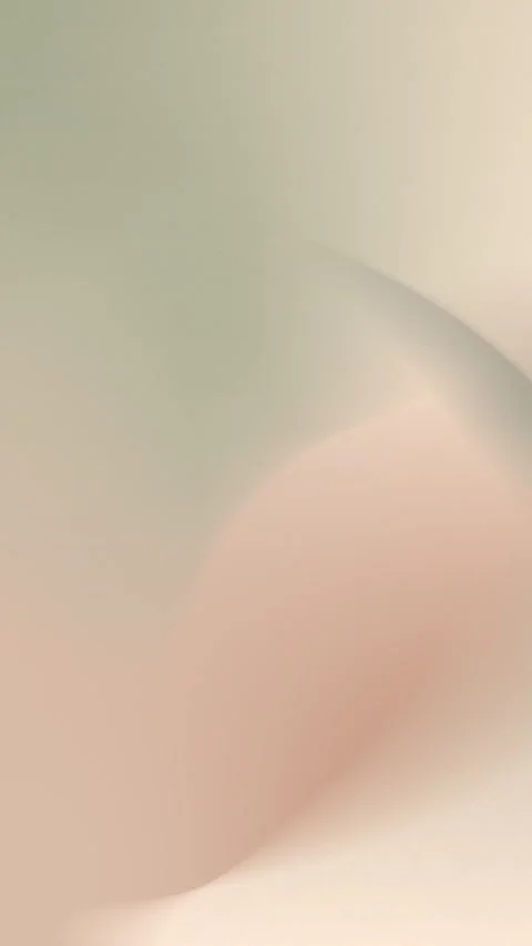 Seamless loop background 4K with smooth, soft pastel gradients in beige and Stock Footage 309957074