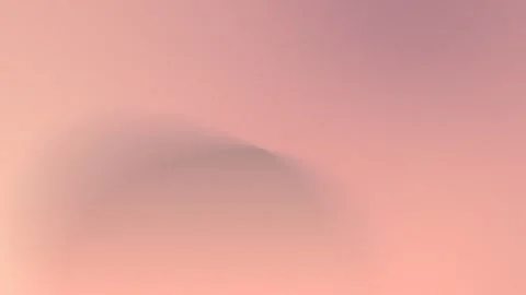Seamless loop background in 4K with a soft pink gradient and an out-of-focus Stock Footage 299447902