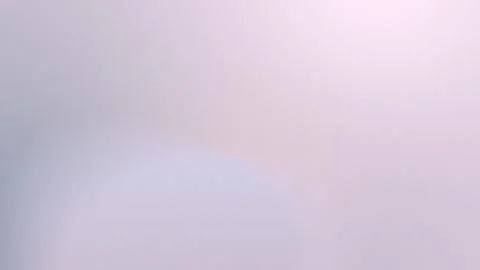 Seamless loop background in 4K. Soft pastel gradient with blurred gray and pale Stock Footage 299447924