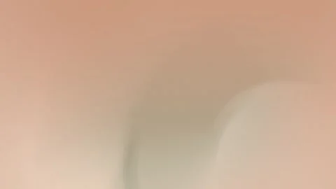 Seamless loop background in 4K. Soft, gradient hues of pink and green blend Stock Footage 299448074