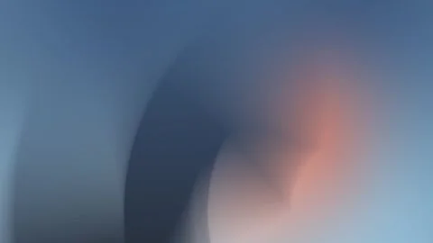 Seamless loop background in 4K with soft gradient blur. Cool blue tones blend Stock Footage 299664580