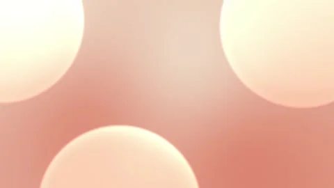 Seamless loop background in 4K with soft peach and cream spherical shapes on a Stock Footage 305344740
