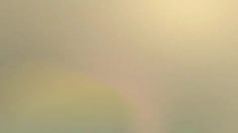 Seamless loop background in 4K. Soft pastel gradient with beige, light pink, and Vídeo Stock 309700787