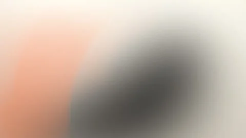 Seamless loop background with blurred orange and black shapes on a soft Stock Footage 299664636