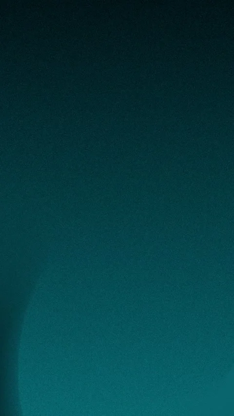 Seamless loop background with dark green gradient and subtle grain texture. 4K Stockbeeldmateriaal 309701661